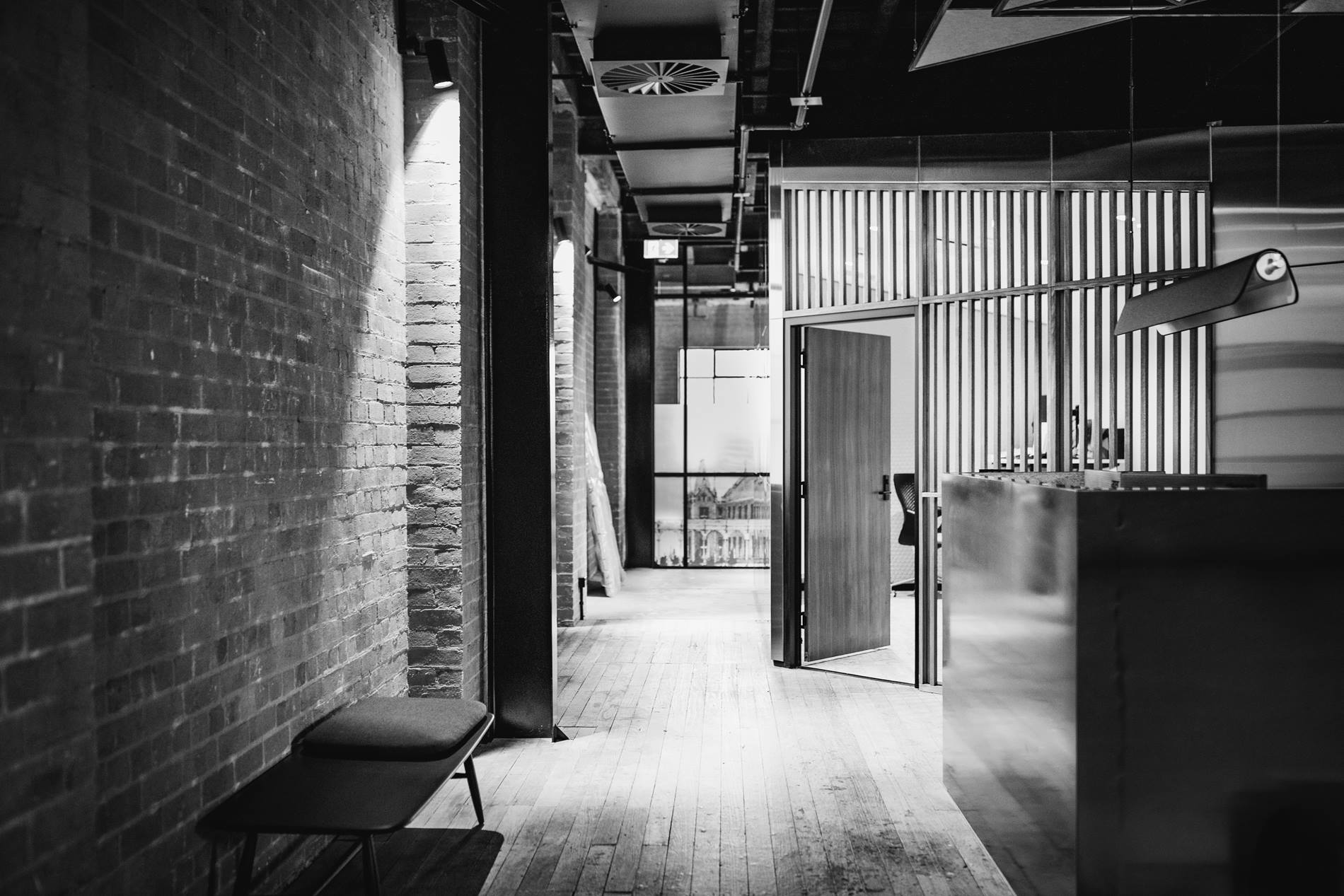 black and white photo of small reception area in hospital