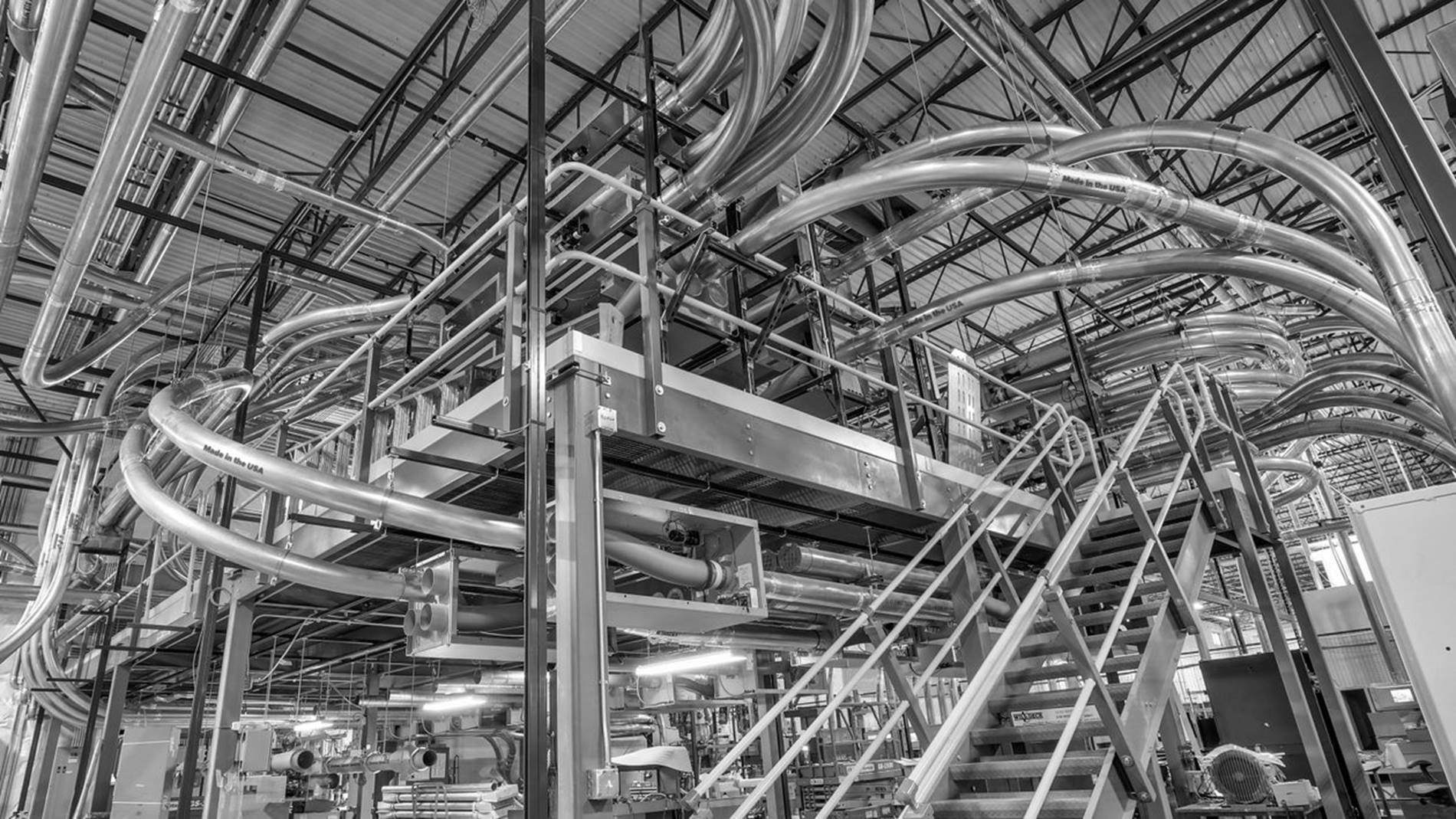 Complex pneumatic tube system in industrial area