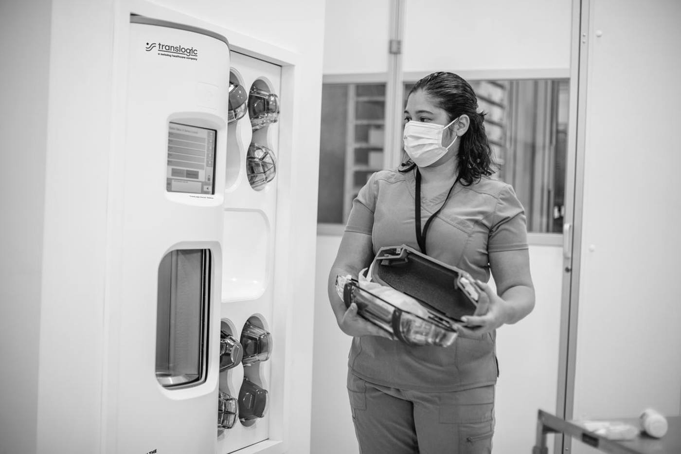 staff using pneumatic tube system