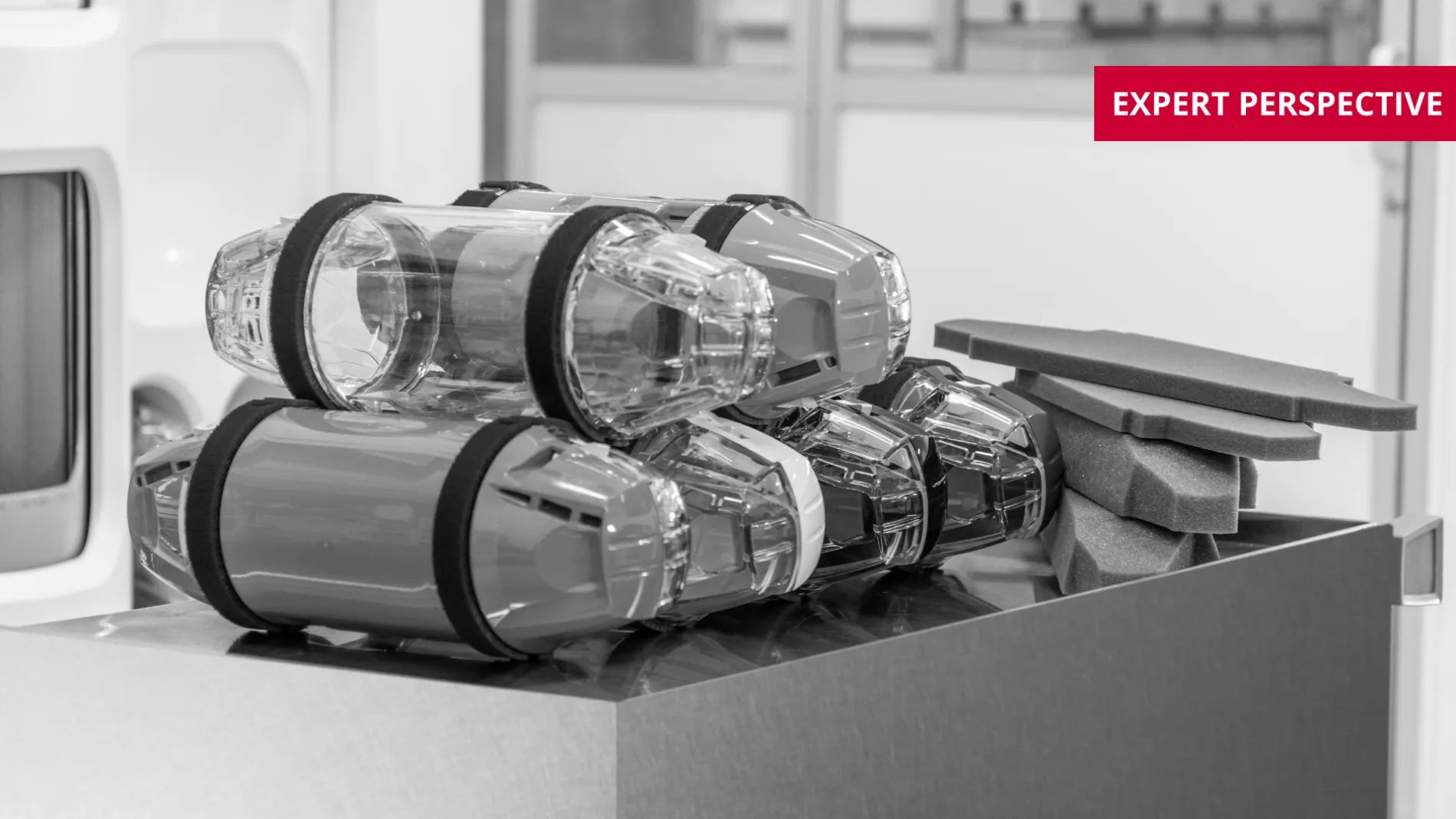 Tube system carriers stacked on table