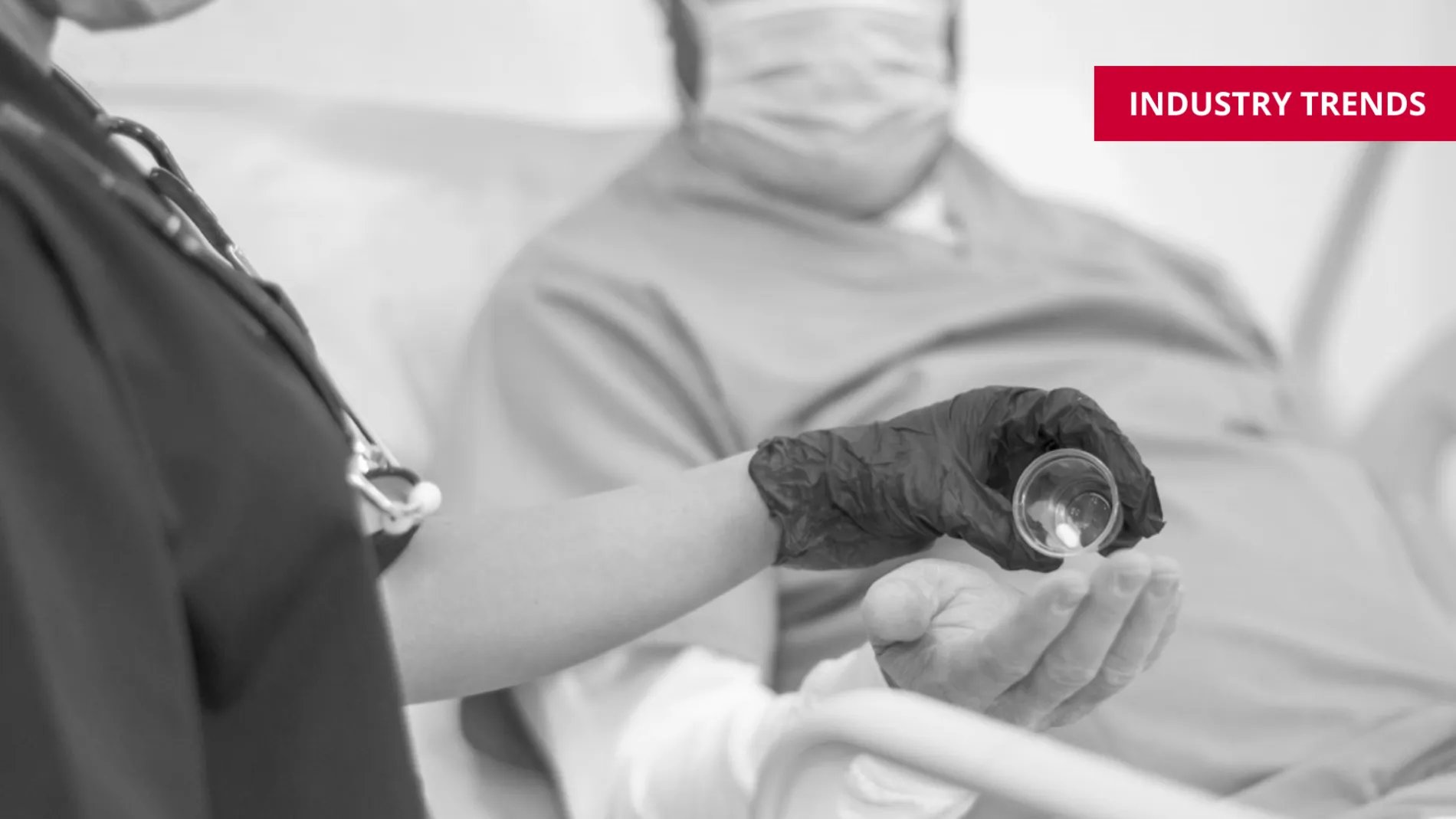 staff handing patient medication