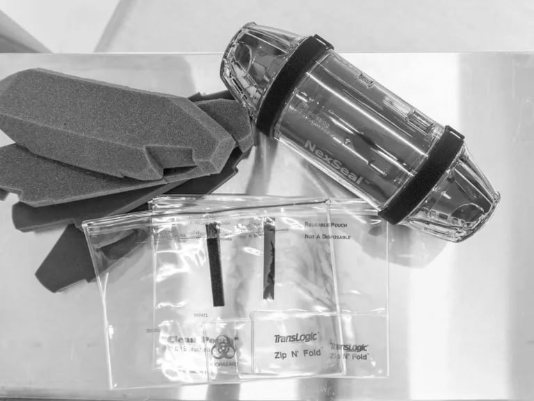 Pneumatic tube system carrier accessories