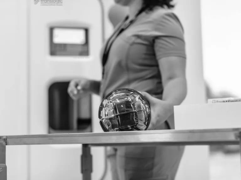 Hospital staff handling carrier