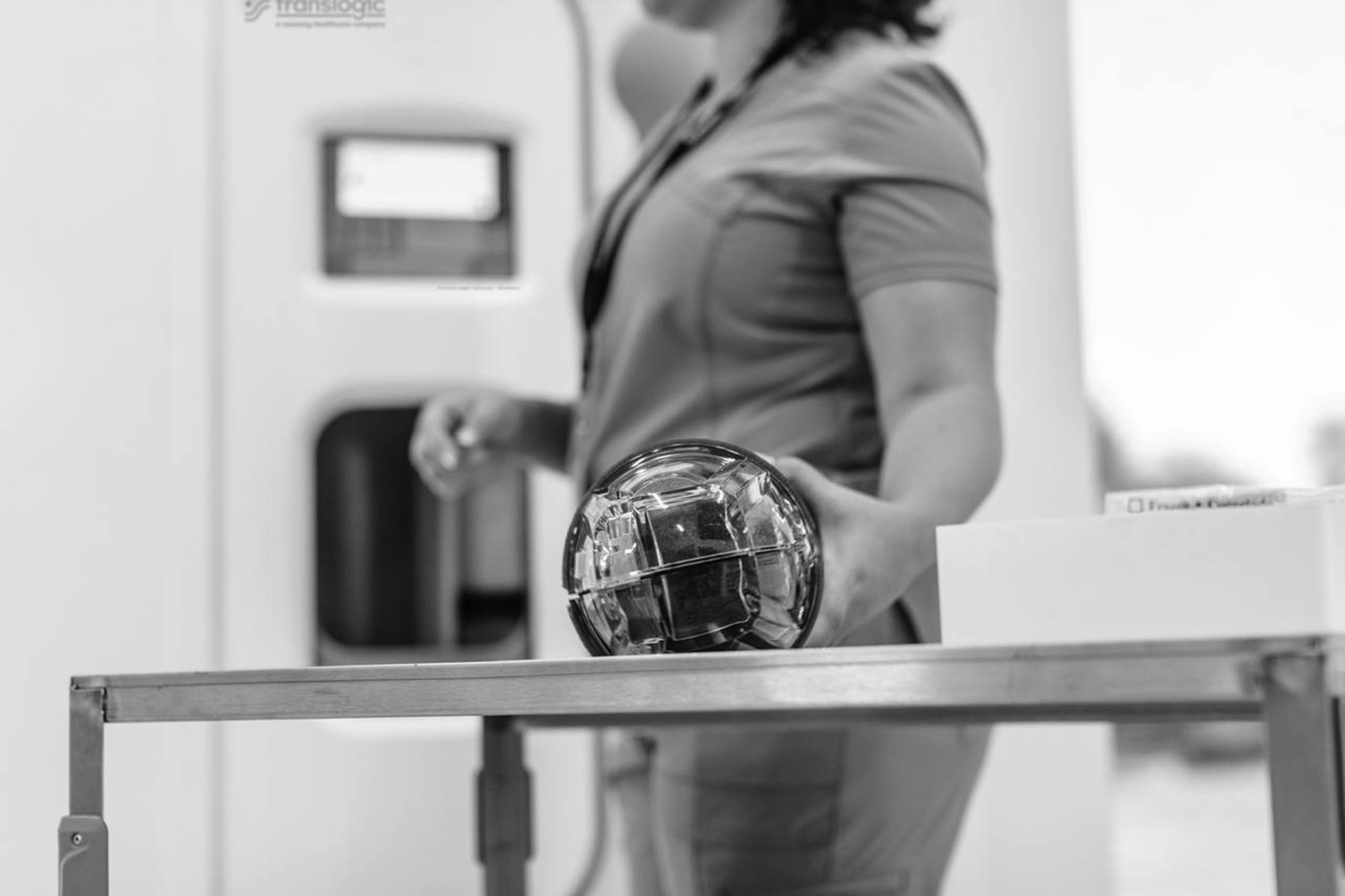 Hospital staff handling carrier