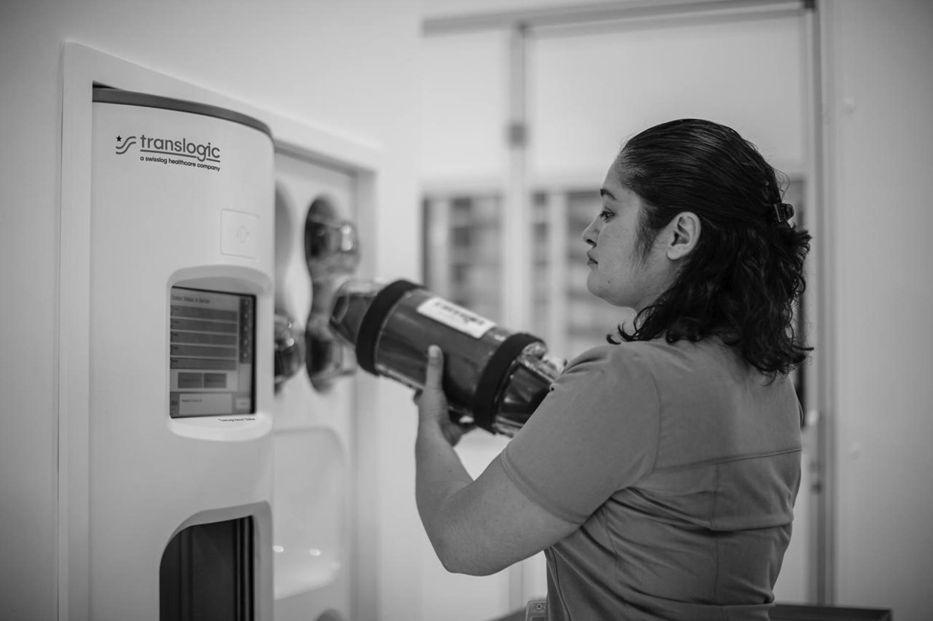 staff using translogic pneumatic tube system
