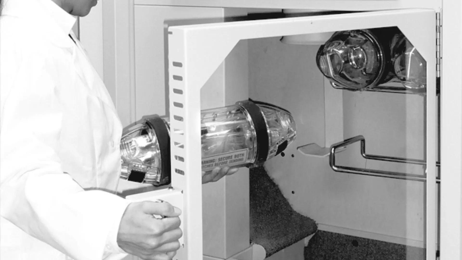 Pharmacist opening TransLogic station access door 