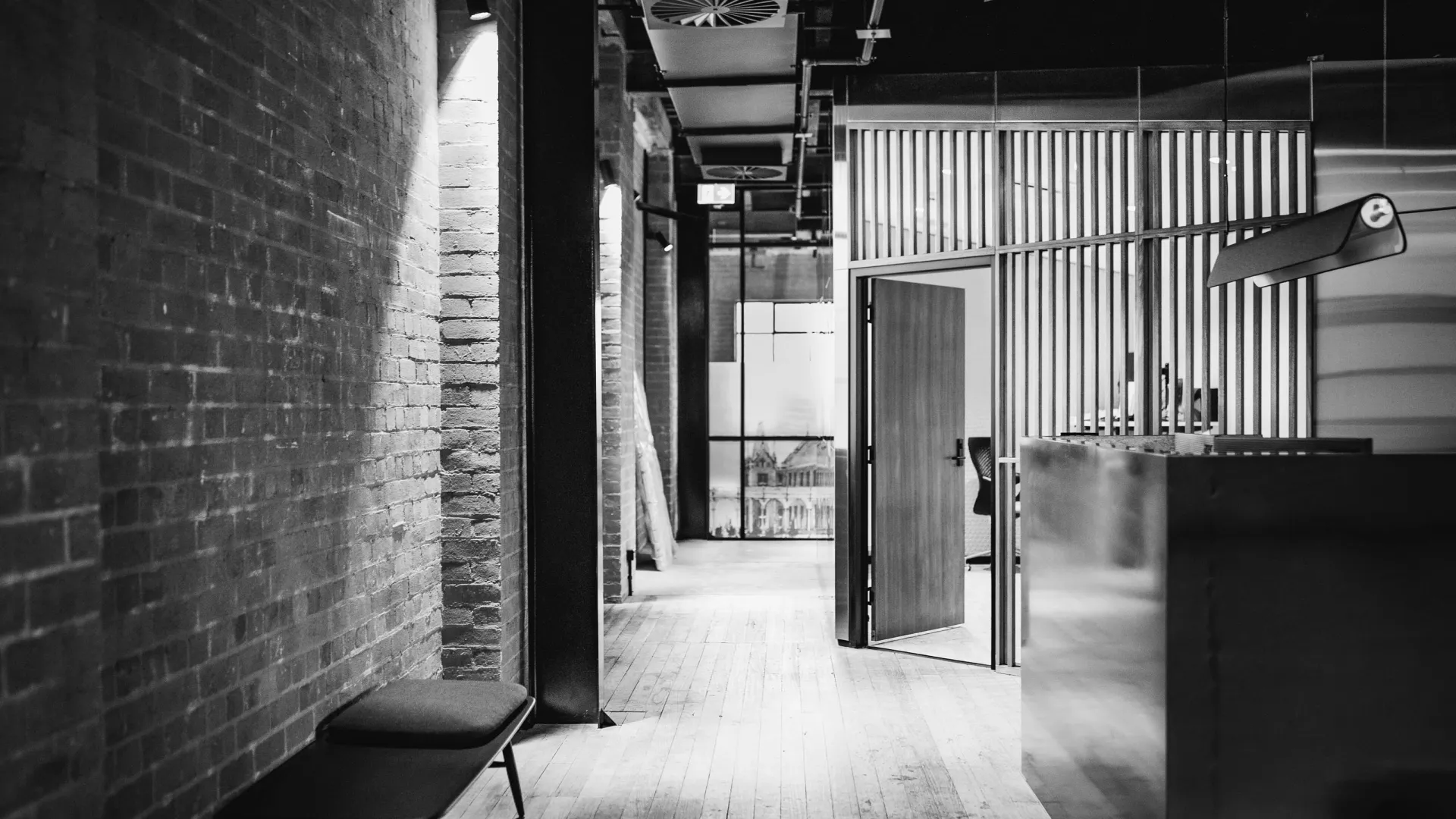 black and white photo of small reception area in hospital