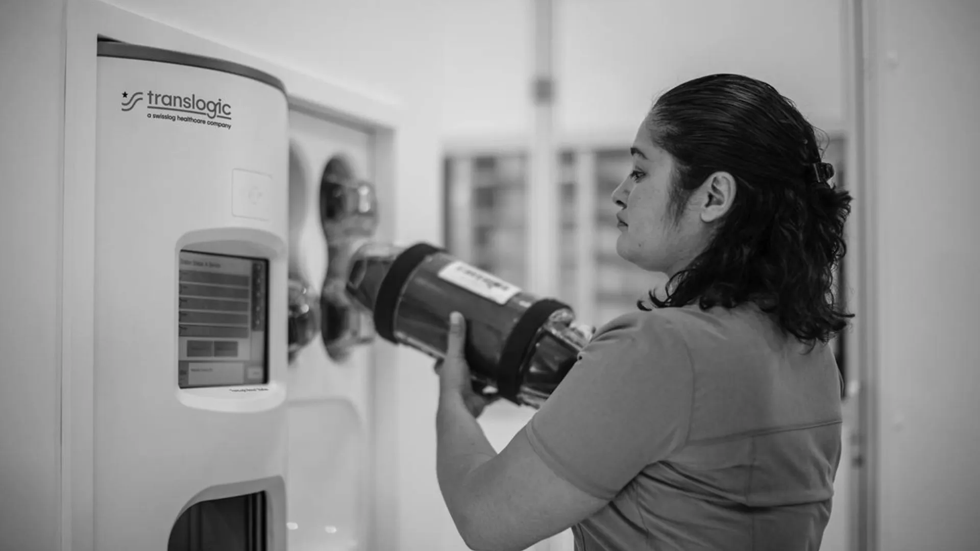 staff using translogic pneumatic tube system