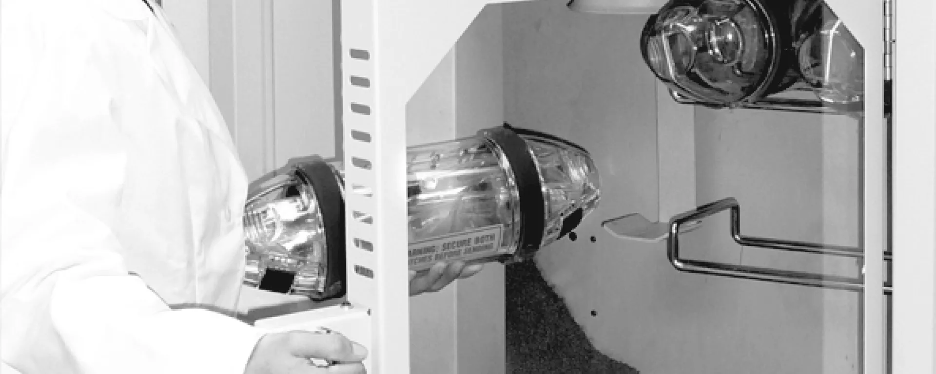 Pharmacist opening TransLogic station access door 