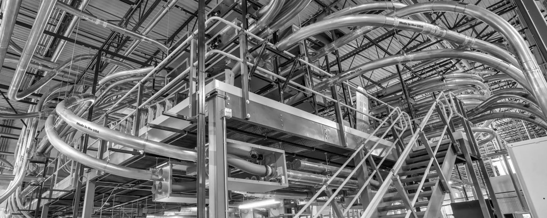 Complex pneumatic tube system in industrial area