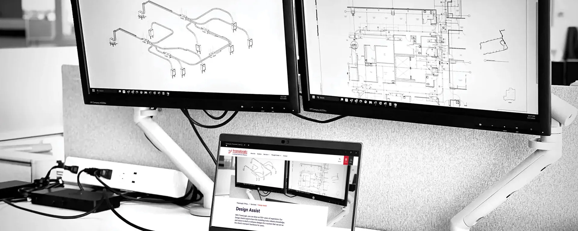 two computers showing bim 3d model and design plans
